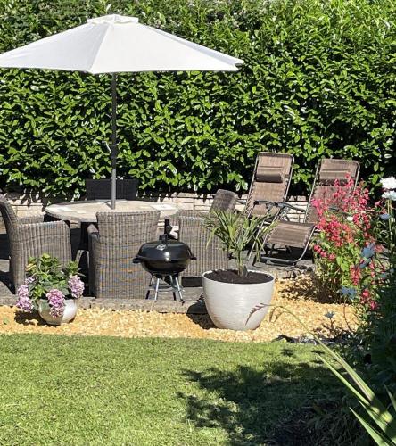 lovely view of garden with furniture